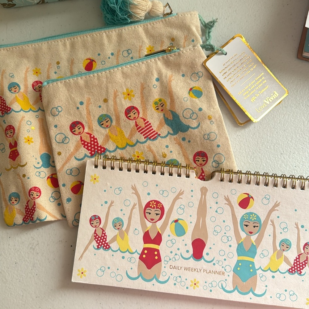 Cute zip up tote with a matching weekly calendar. New with tags. 3 items